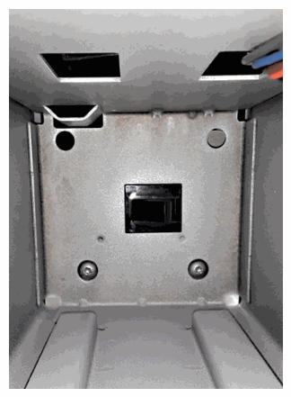 Coin-vault switch inside an Alliance stack washer-dryer