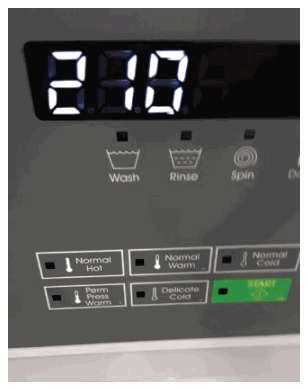Machine display showing the vend price before programming